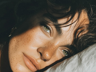 Close-Up of a Woman in Shadow